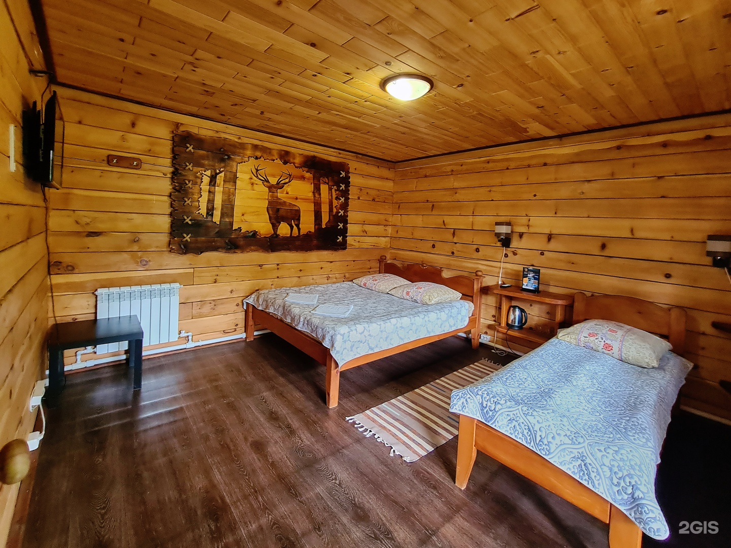 Трехместный номер с двуспальной и односпальной кроватями - фото 3