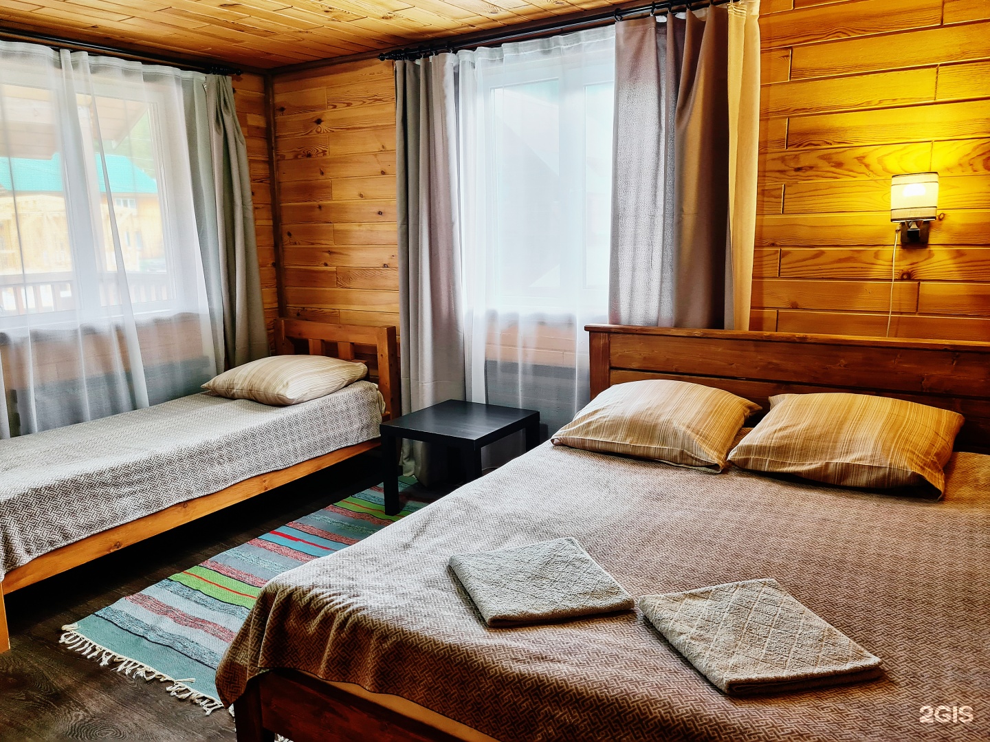 Трехместный номер с двуспальной и односпальной кроватями - фото 6