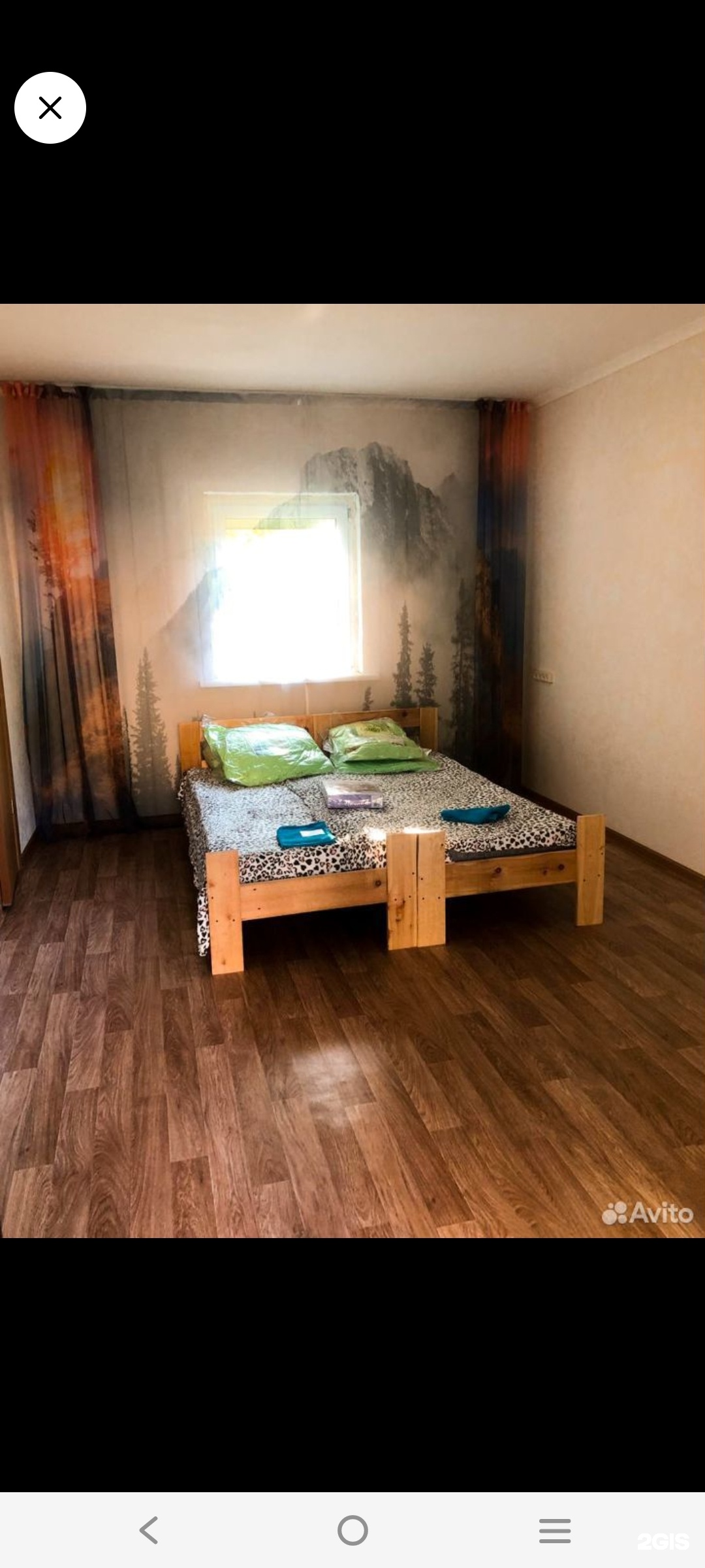 Четырехместный номер с 1 двуспальной или 2 односпальными кроватями с видом на горы